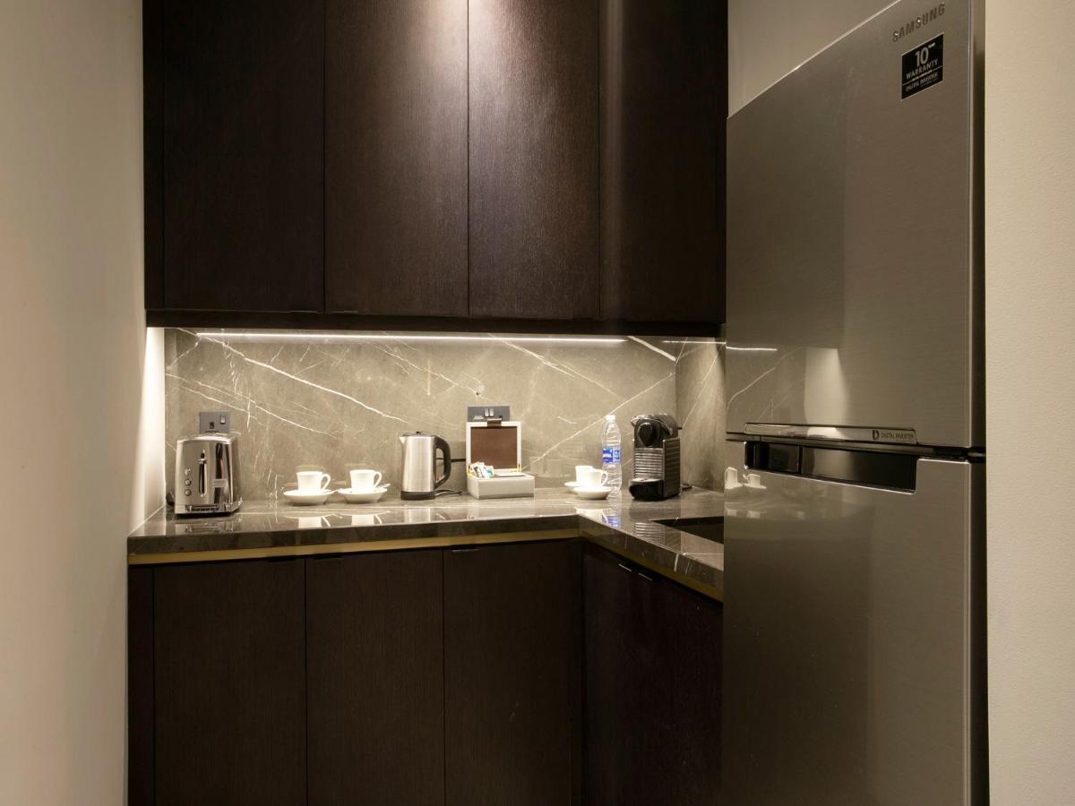 Hyatt Regency Al Kout Mall Kuvait Kültér fotó A kitchen in a hotel room